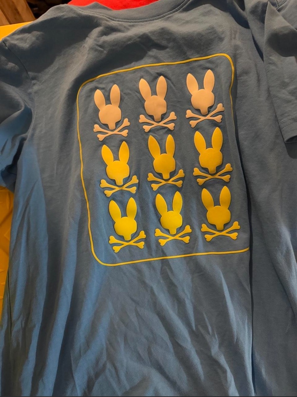 Psycho Bunny Blue Tee with Yellow & Pink Bunny Skull Grid
